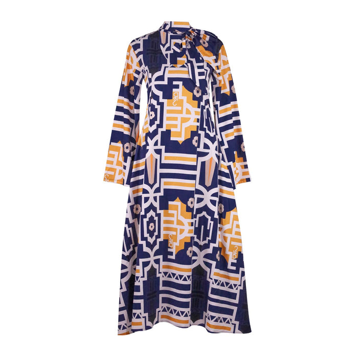 African print maxi dress, FabroSanz long sleeve dress, modest African fashion, navy and mustard print dress, African luxury brand dress, Tshwane inspired womenswear, full-length printed dress South Africa, heritage print fashion, African occasion wear.