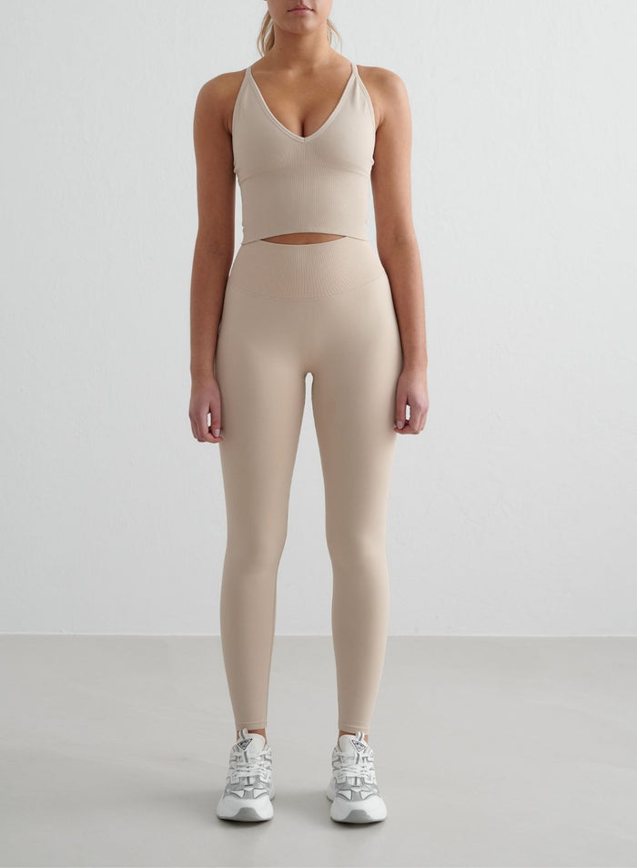Clay aim'n Shape Seamless Cross Back Bralette and matching tights with ribbed details and a second skin feel.