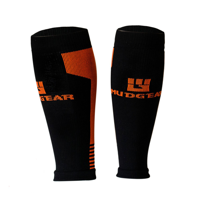 Black and orange compression calf sleeves with MudGear branding and ribbed design