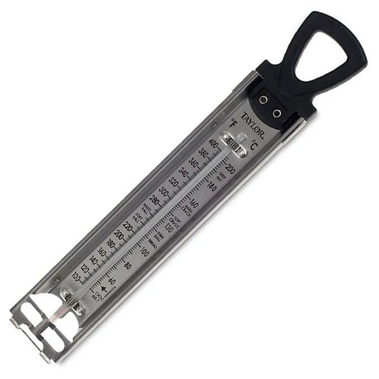 A stainless steel confection thermometer with a black pot clip on the back, displaying a scale in °F.