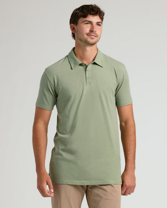 Man modeling Dark Heather Bay Green Short Sleeve Tall Polo.