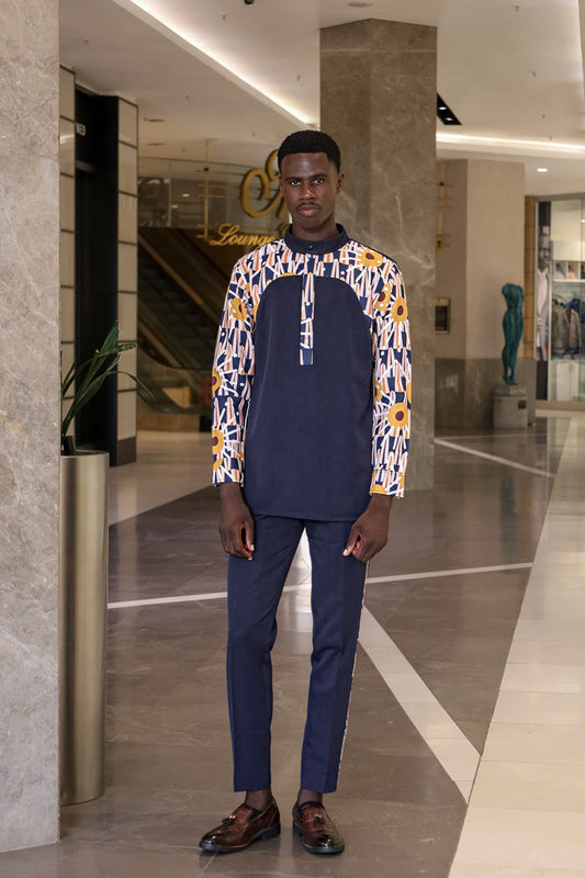 men’s African print shirt, FabroSanz Tshwane print men’s wear, heritage inspired men’s shirt, navy shirt with African print detail, modern African men’s fashion, smart-casual men’s shirt South Africa, mandarin collar shirt with print, bold men’s cultural wear, African designer men’s fashion, tailored heritage men’s shirt.