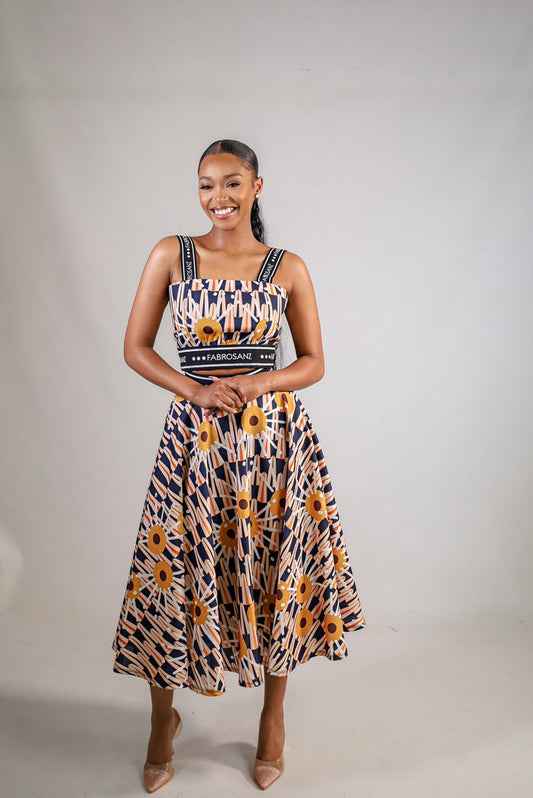 model wearing tshwane print set with a neutral background