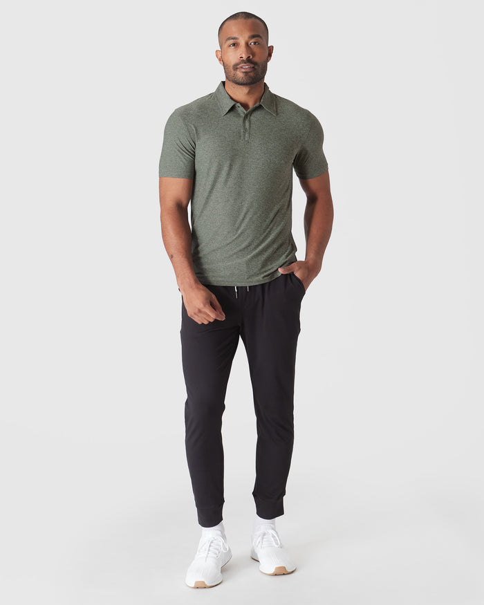 Heather Forest Active Polo 2.0 worn by man with a relaxed pose.