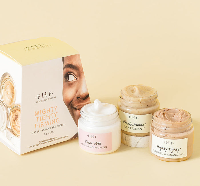 Mighty Tighty® Firming 3-step Instant Spa Facial | Farmhouse Fresh skincare set with Three Milk Moisturizer, Finely Awaken Plant Exfoliant, and Mighty Tighty Turmeric & Banana Mask in jars and packaging.