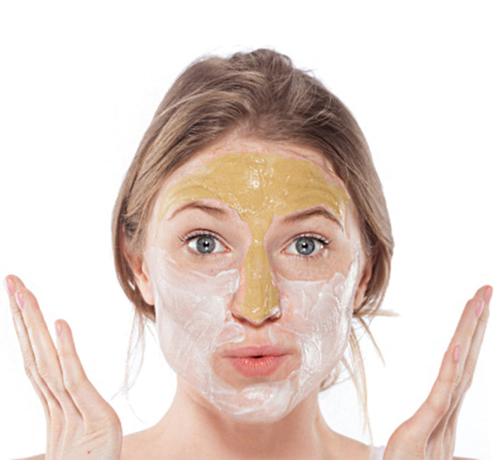 Woman with multi-step facial mask applied to her face demonstrating the Mighty Tighty® Firming 3-step Instant Spa Facial | Farmhouse Fresh skincare product.
