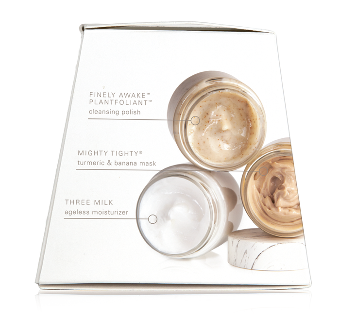 Clear packaging showing three open jars of Mighty Tighty® Firming 3-step Instant Spa Facial | Farmhouse Fresh skincare products including a cleansing polish, turmeric and banana mask, and ageless moisturizer.
