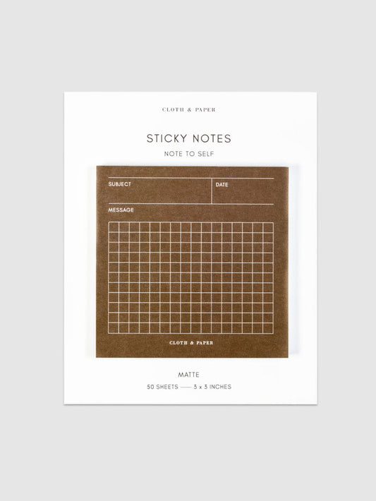 Note to Self Sticky Notes against a neutral background.