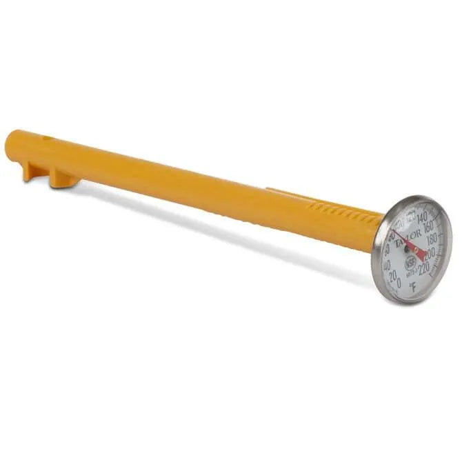 A stainless steel chef's pocket thermometer with an orange protective cover and dial, and a probe attached.
