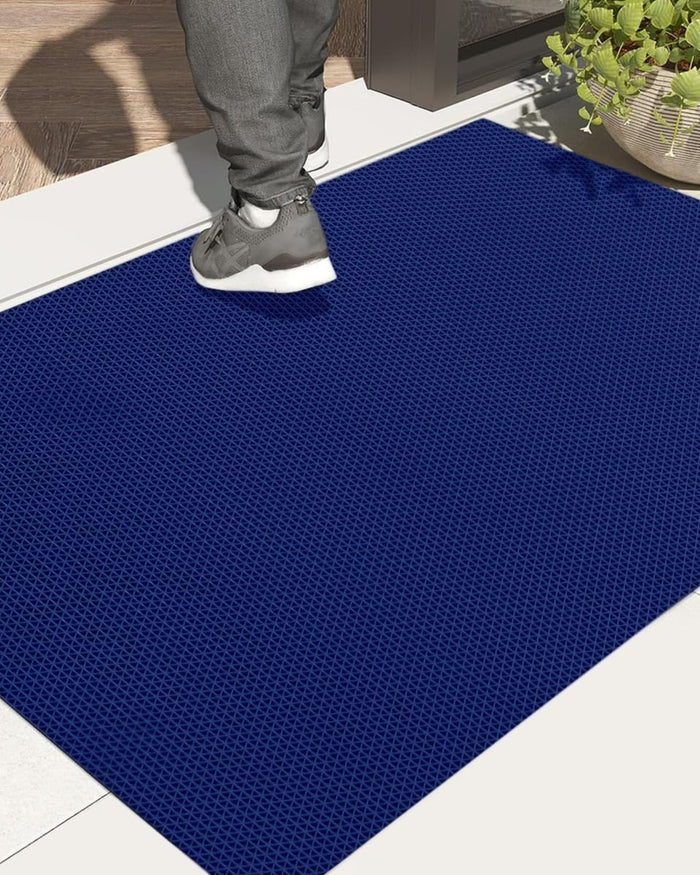 Blue anti-slip PVC floor mat with raised diamond grid, laid flat