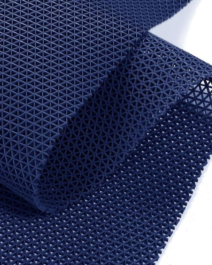 Blue PVC floor mat close-up with raised diamond anti-skid grid