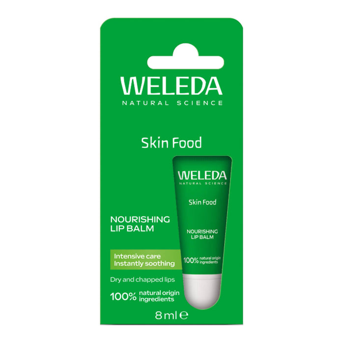 Weleda Skin Food Nourishing Lip Balm in its green retail packaging, featuring a small green and white tube of lip balm. Intensive care, instantly soothing.