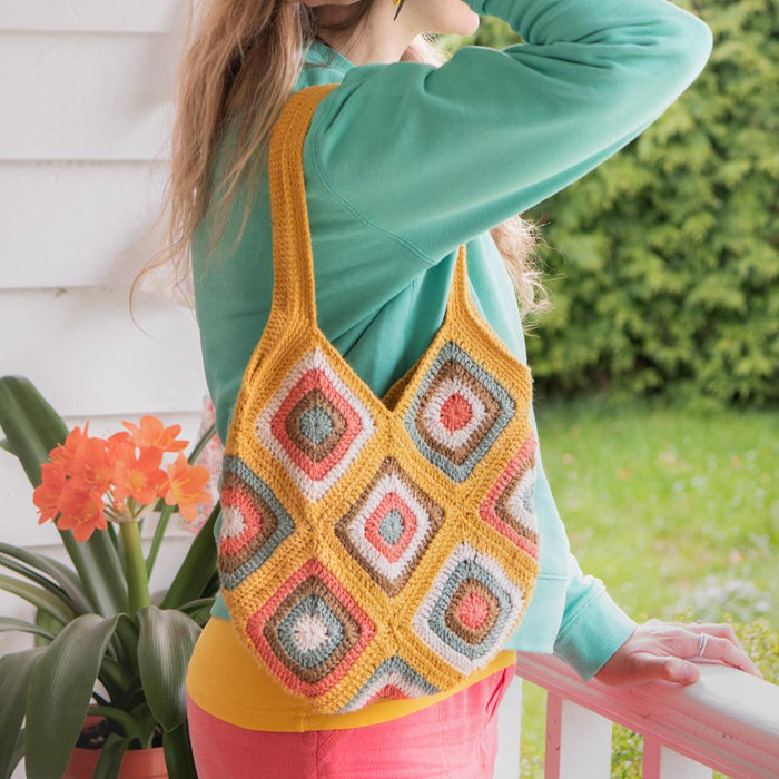 Inspired by summer sunshine, Bruna Biavati’s Solana Bag is a granny square accessory