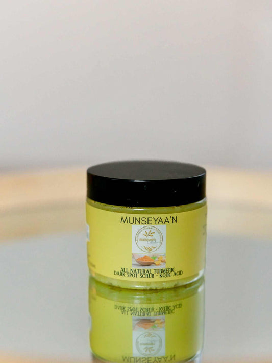 Jar of turmeric scrub for dark spots with natural exfoliating ingredients and nourishing oils