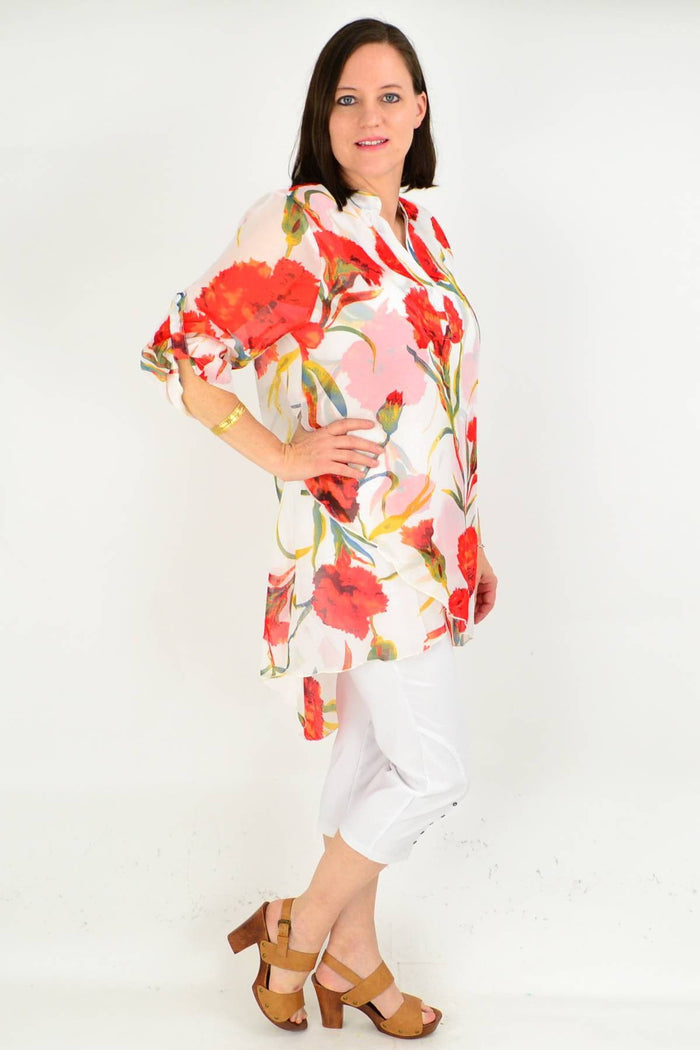 White floral button-up sleeve tunic shirt by whispers, featuring a relaxed fit, floral pattern, and classic collar detail.